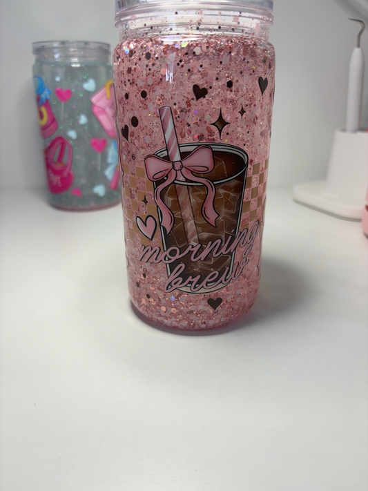 Pink glitter 16oz snow globe tumbler with Morning Brew bow design