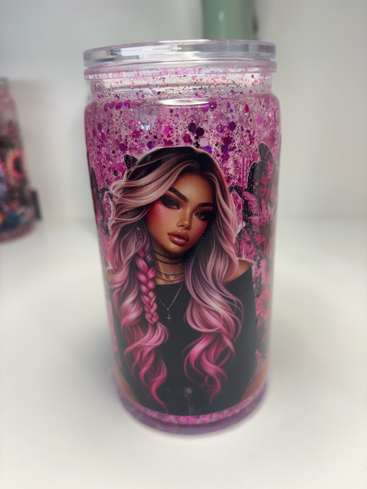 Pink glitter 16oz snow globe tumbler with pink-haired butterfly girl design